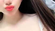 Asian hottie with nice big boobs