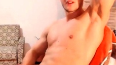 Handsome fitted dude wanking big cock