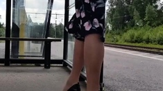 HannaTransa Chastity Crossdresser outdoors at train station.