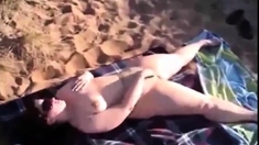 Mom Jenny Masturbaties On A Public Beach